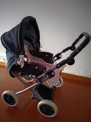 Carro de muñecas azul y rosa