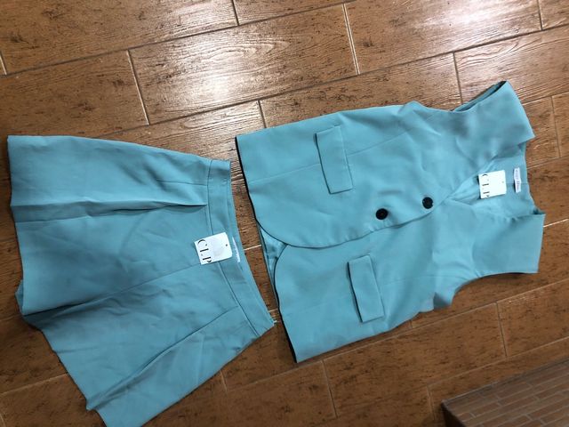 Set gilet e pantaloncini verde bluastro