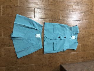 Conjunto chaleco y pantalón corto verde azulado