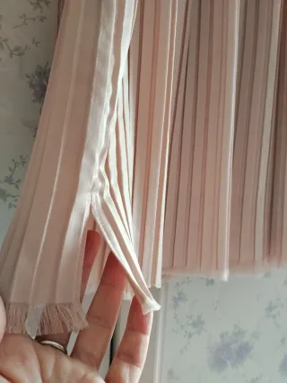 Falda plisada rosa y dorada