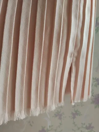 Falda plisada rosa y dorada