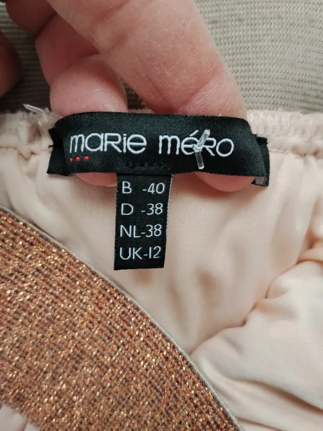 Falda plisada rosa y dorada