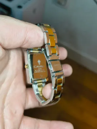 Reloj CAUNY bicolor dorado y plateado