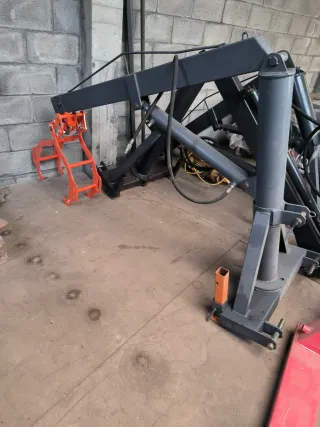 Pluma con pinza pequeña y prolonga manual