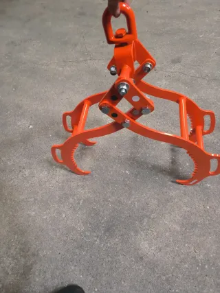 Pluma con pinza pequeña y prolonga manual