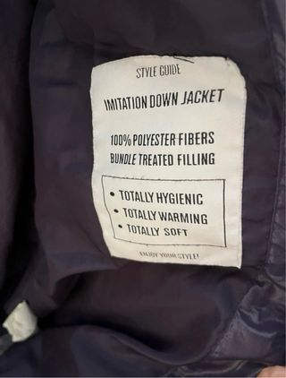 Chaqueta acolchada morada con cinturón