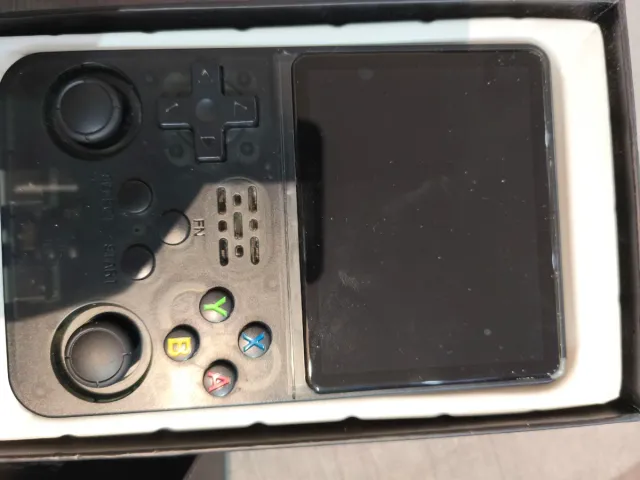 Consola de videojuegos R36S 64 gb mas de 15 mil ju