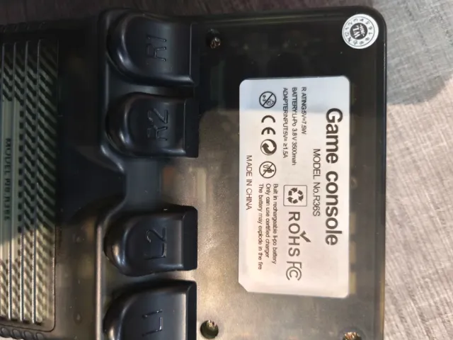 Consola de videojuegos R36S 64 gb mas de 15 mil ju