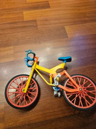Bicicletta Barbie con ruote arancioni