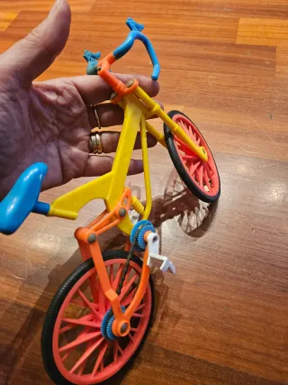 Bicicletta Barbie con ruote arancioni