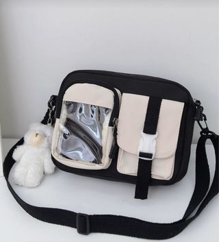 Bolso negro y beige con osito