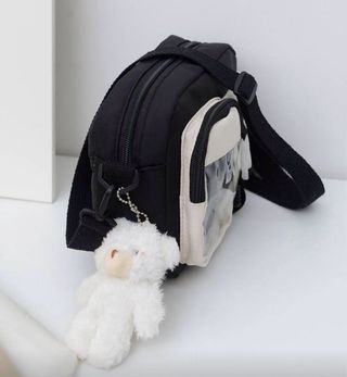 Bolso negro y beige con osito