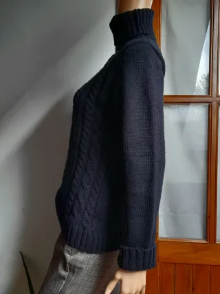 Jersey punto trenzado de lana y cuello alto