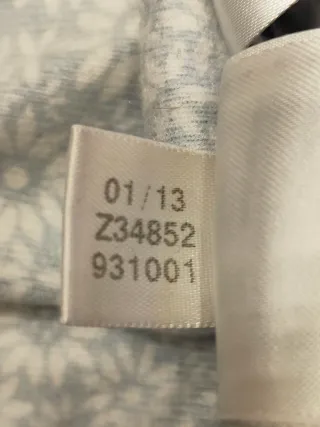 Giacca Adidas floreale nera e bianca