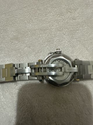 Reloj de pulsera plateado y blanco