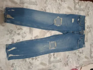Pantalón vaquero desgastado azul