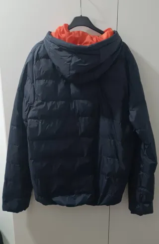 Chaqueta acolchada hombre azul y naranja