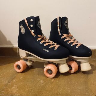 Patines Oxelo 4 ruedas azul y rosa