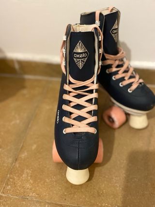 Patines Oxelo 4 ruedas azul y rosa