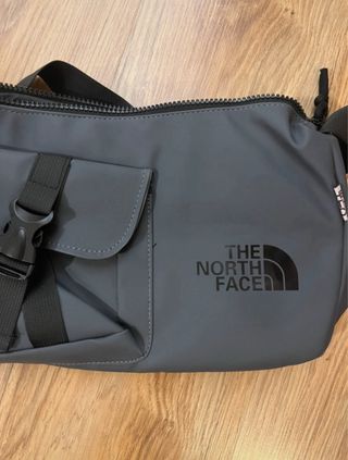 Bandolera The North Face  gris oscuro NUEVA