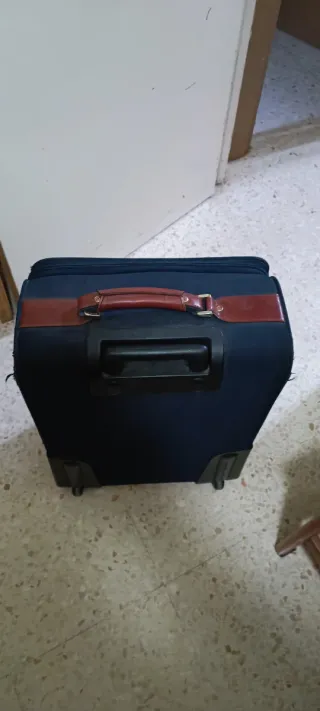 Maleta de viaje Samsonite negra y marrón