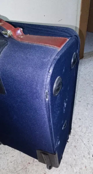 Maleta de viaje Samsonite negra y marrón