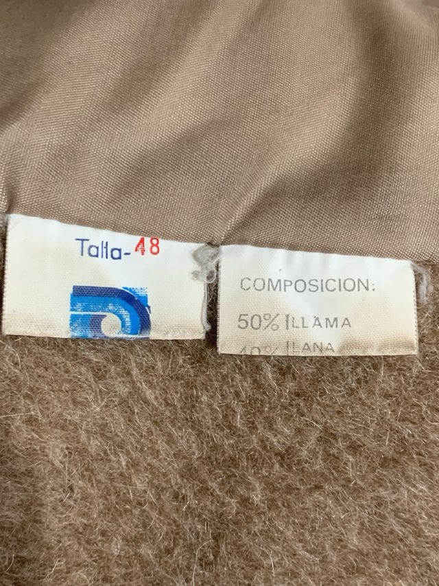 Cappotto beige con collo di pelo