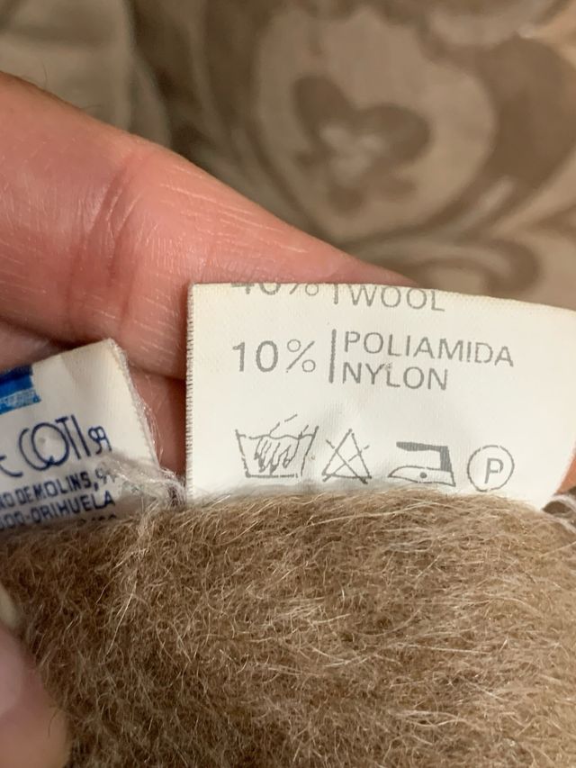 Cappotto beige con collo di pelo