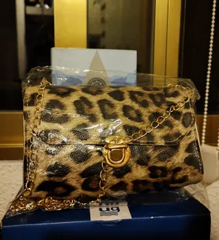 Top rojo tirantes talla M y bolsito animal print