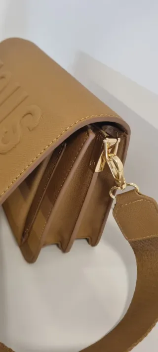 Bolso Tous bandolera beige y marrón