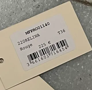 Top Maje plisado rojo estampado margaritas