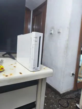 Nintendo Wii Blanca con 2 mandos y accesorio