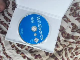 Nintendo Wii Blanca con 2 mandos y accesorio