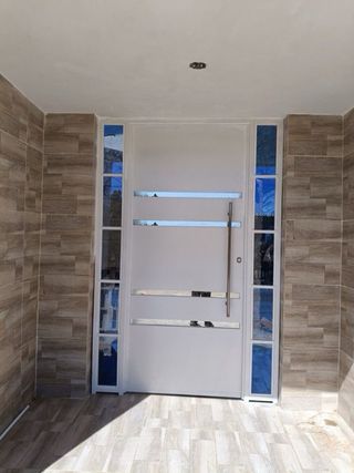 Cambio de Puerta principal y de paso