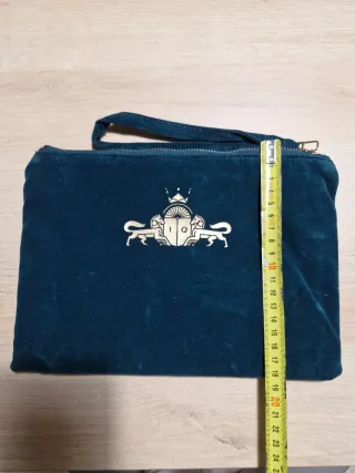 Bolso de mano clutch.