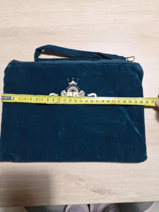 Bolso de mano clutch.