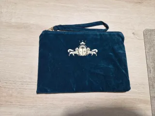 Bolso de mano clutch.