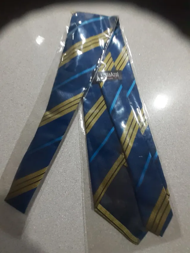 Corbata KostaAzul rayas azul y dorado