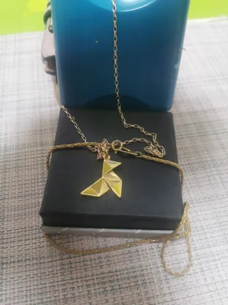 Colgante PAJARITA dorada. Elegir una cadena