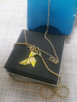 Colgante PAJARITA dorada. Elegir una cadena