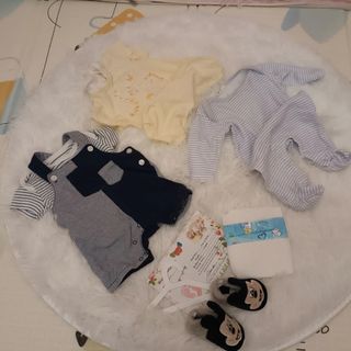 Bambola Reborn con ciuccio e peluche