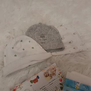 Bambola Reborn con ciuccio e peluche