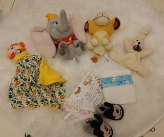 Bambola Reborn con ciuccio e peluche