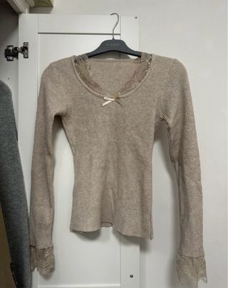 Top manga larga encaje y lazo