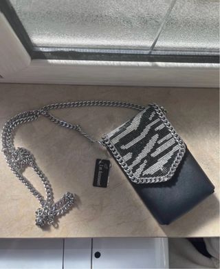 Mini borsa nera con fantasia zebrata