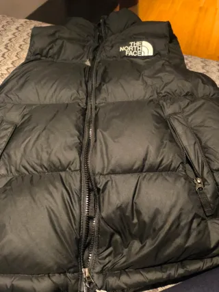 Chaleco The North Face Negro. Tiene  roto pequeño.