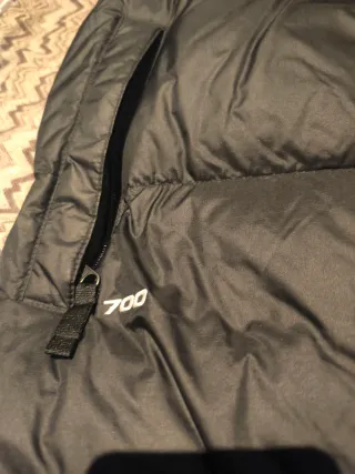 Chaleco The North Face Negro. Tiene  roto pequeño.