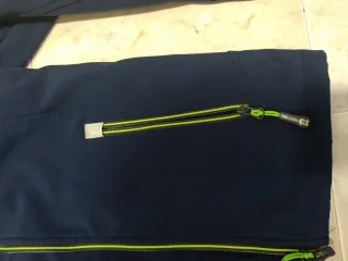 Chaqueta cortavientos Trollkids azul y verde