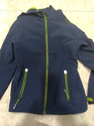 Chaqueta cortavientos Trollkids azul y verde