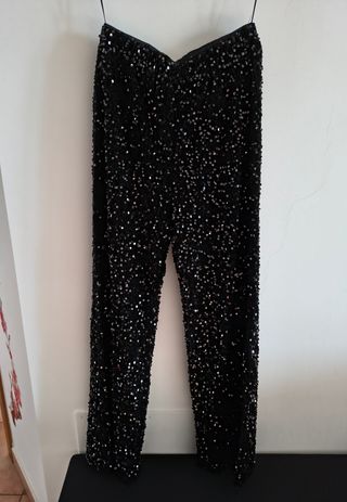 Pantaloni palazzo con paillettes